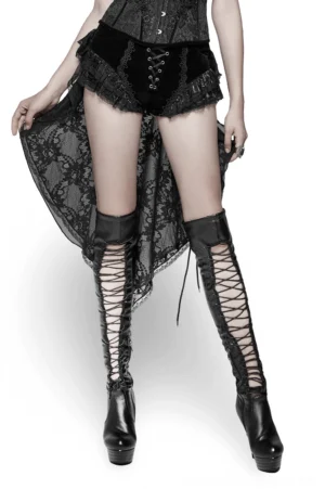 Gothic swallow tail velvet shorts with lace-up front and rose-patterned sheer lace back, front three-quarter view on model