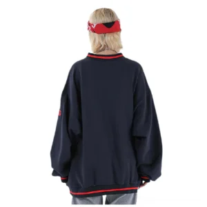 Navy blue gothic baseball sweatshirt back view showing red striped ribbed hem and sleeve details