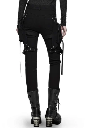 Black gothic pants rear view showing detachable cargo pockets and combat boot styling