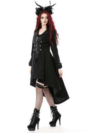 Gothic high-low coat worn on model from three-quarter angle, showcasing fitted waist, thigh-high fishnet stockings, and stiletto boots