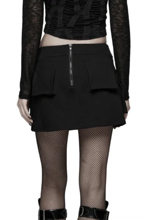 Rear view of black gothic cargo skirt with center back zipper and flap pockets, styled with fishnet stockings