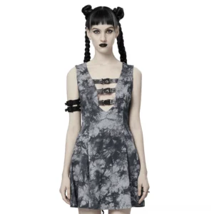 Gothic tie-dye buckle dress front view with deep V-neckline and triple black buckle straps on model with braided hair