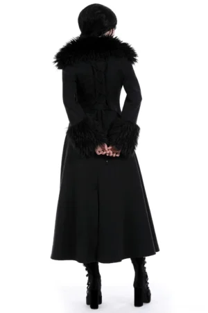 Black gothic trench coat back view showing corset lace-up design and faux fur trim details on female model against white studio background