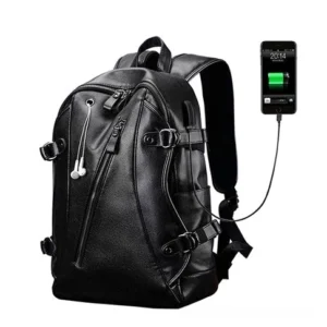 Black gothic USB charging backpack front three-quarter view with external charging port demonstration