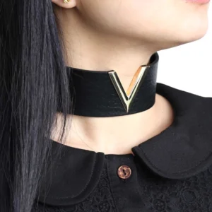 Black V-choker worn on model's neck styled with black goth outfit, close-up showing fit and styling with alternative fashion