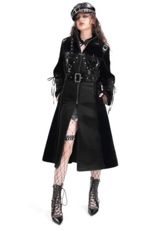 Black velvet and faux leather gothic long coat with studded buckle detail, front full-body view on model