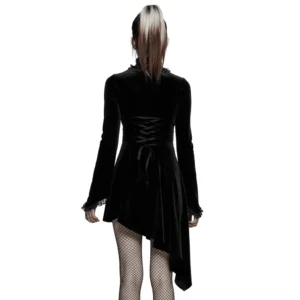 Black gothic velvet asymmetrical dress showing corset lace-up back design with fishnet tights, rear full-body view