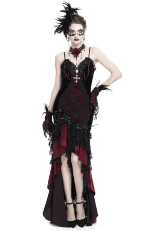 Black velvet gothic high-low dress with burgundy satin ruffles and beaded cross pendant - front view on model