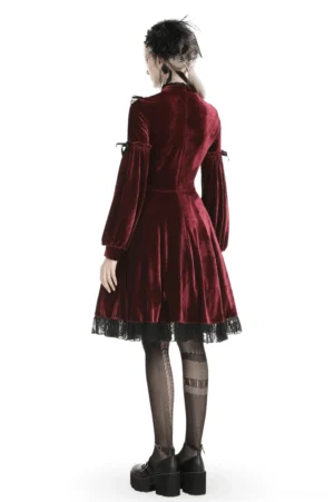 Victorian gothic dress with voluminous puff sleeves and black lace hem - back view on model