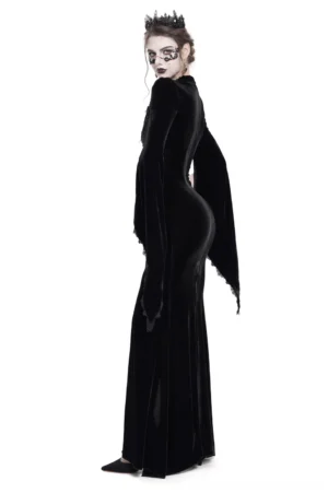 Gothic black velvet mermaid dress with flared sleeves, side profile showing fitted silhouette and floor-length hem