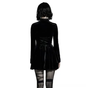 Black velvet gothic flare mini dress with corset lace-up back - back view on model showing fishnet stockings