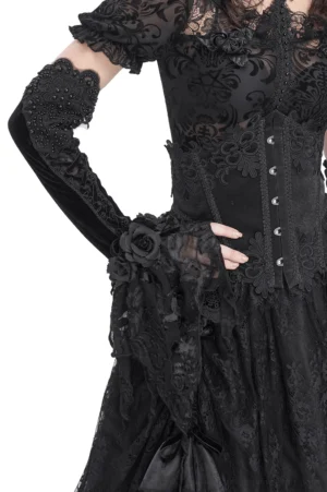 Black velvet gothic evening gloves with beaded lace fingerless design worn on model in formal gothic gown, side view