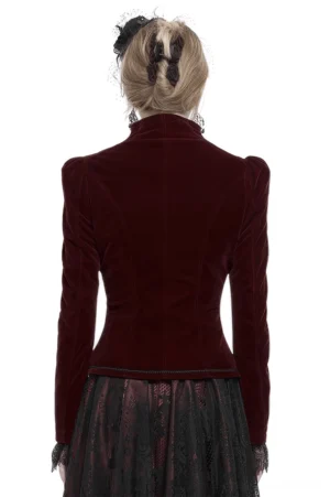 Burgundy gothic velvet jacket rear view displaying tailored waist and solid velvet back panel construction on model