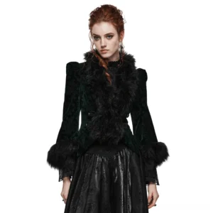 Black embossed velvet gothic short jacket front three-quarter view with green floral pattern and black faux fur trim worn by model