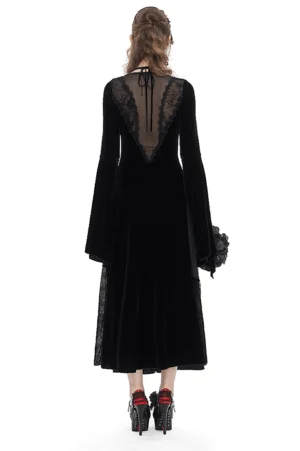 Gothic velvet maxi dress back view featuring sheer lace back panel and tie-neck closure on model