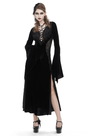 Black velvet Gothic maxi dress with lace-up corset front and floral embroidered flared sleeves, worn by model showing front three-quarter view