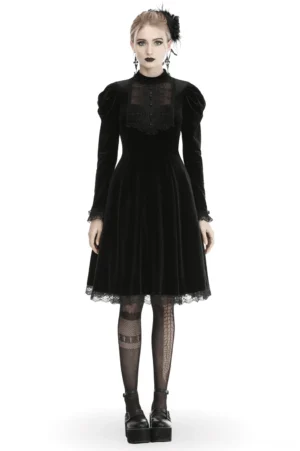 Victorian black velvet gothic midi dress with puff sleeves and lace trim - front full-body view on model