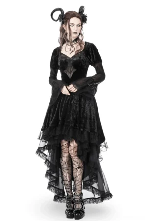 Black crushed velvet high-low dress with spiderweb mesh chest cutout, front full-body view on model with gothic styling