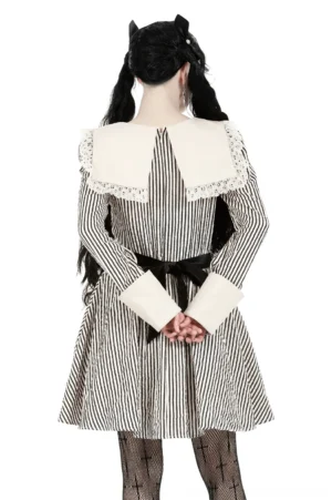 Black and white striped gothic dress back view with waist sash bow detail, rear model styling