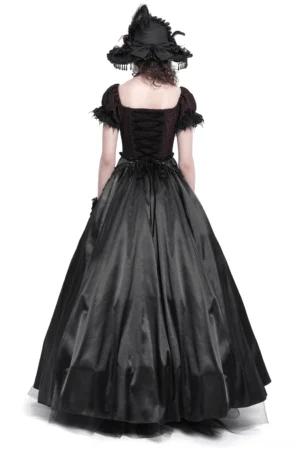 Back view of black burgundy gothic Victorian formal gown featuring full satin skirt and structured ruffle sleeves, dramatic evening dress silhouette