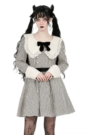 Black and white striped gothic Victorian dress with lace collar and velvet bow, modeled front view