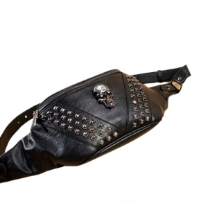 Gothic crossbody waist bag 3/4 side angle showing silver metal studs, skull decoration, and adjustable shoulder strap