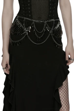 Gothic layered metal waist chain with blade charms worn on female model, front three-quarter view displaying multi-strand chain design and scale armor details