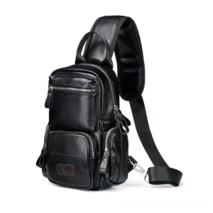 Black gothic waterproof chest bag with pebbled leather texture and metal zippers - three-quarter front view