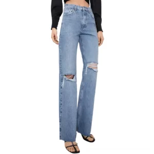 Ripped high-waist wide leg gothic jeans front view on model - light wash distressed denim with knee holes