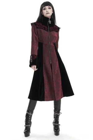 Wine red and black gothic coat front full view on goth model with stand collar and embroidered details