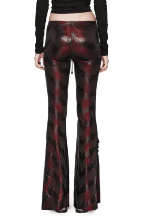 Back view of gothic wine red sparkly flared pants showing drawstring ankle detail and side lace-up accents