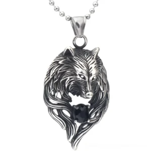 Gothic wolf head pendant necklace with black crystal inlay, front overhead view on white studio background