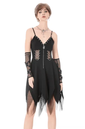 Black gothic zip front mini dress with fishnet jagged hem and studded neckline worn by model with matching fishnet gloves, front view on white studio background