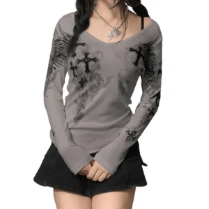 Gray gothic cross wings long sleeve top with ribbed V-neck, front view on model with braided hair against white background