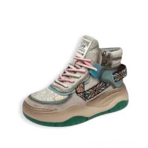Gray patchwork gothic platform lace-up boots with beige and turquoise accents, front display with green platform sole