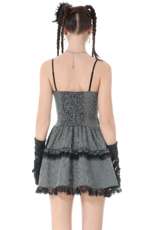Gray pinstripe gothic lolita mini dress back view showing smocked back panel and layered ruffle skirt