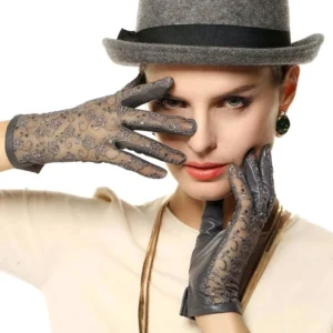 Grey two-tone leather lace gloves worn with fedora hat, model demonstrating gothic fashion styling, formal event look
