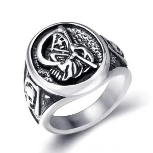 Grim Reaper stainless steel gothic ring top three-quarter view showing engraved reaper and side skull details with dark silver patina finish