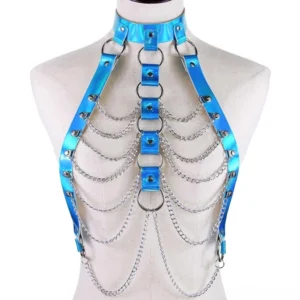 Bright blue holographic bondage body chain harness featuring stacked metal rings and decorative chain tassels, full front view