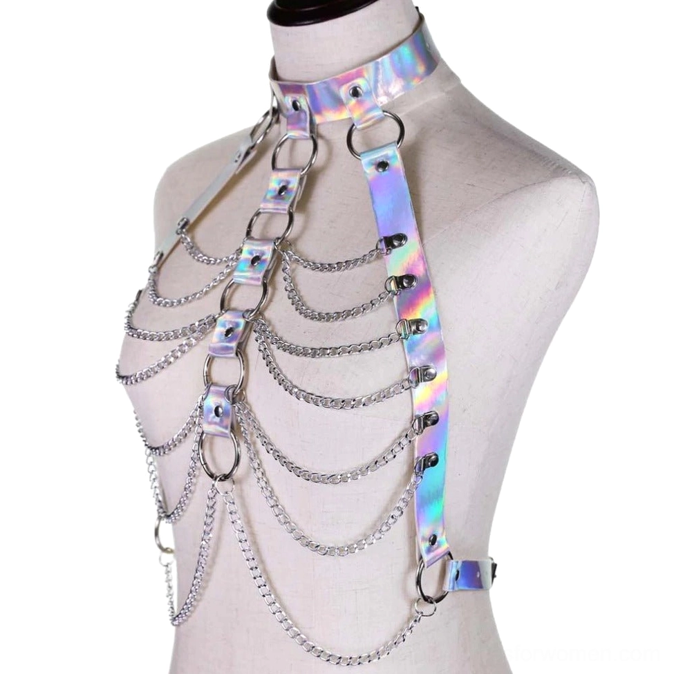 Holographic iridescent silver-purple chain body harness bra with metal D-rings and PU leather straps, left side front view