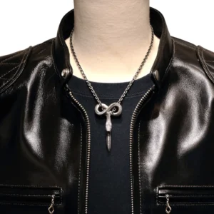 Punk infinity loop carved snake pendant necklace front view on male model with dark leather outfit