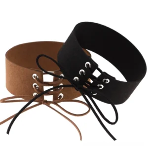 Stacked black and brown lace-up velvet chokers displaying color variety and suede texture design