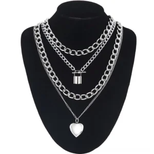 Layered silver heart chain necklace displayed on black mannequin, front shooting view with cylinder lock and heart pendants