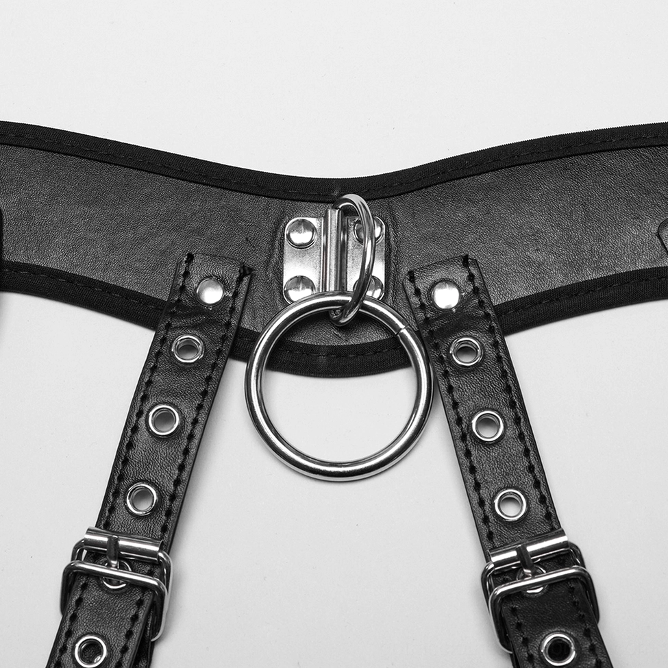 Close-up side view of harness connection components showing black leather straps with metal rivets and central O-ring fastener