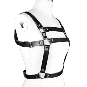 Black leather chest harness displayed on dress form mannequin, side view highlighting adjustable waist strap and metal rivets