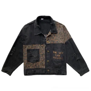 Leopard embroidered denim jacket flat lay, showing metal snap button closure and patchwork design details
