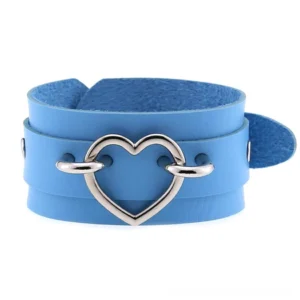 Light blue leather heart cuff bracelet with silver heart buckle, flat lay front view showcasing gothic aesthetic
