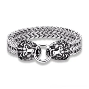 Lion head stainless steel gothic bracelet with wheat link chain - flat lay top-down view showcasing the dual lion head clasp and brushed silver finish