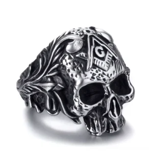 Masonic skull gothic ring front three-quarter view showing Square and Compass emblem with floral vine band details in stainless steel