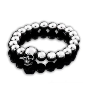 Memento Mori skull beaded bracelet flat lay - stainless steel gothic jewelry with 3D skull charm and round metal beads